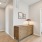 a hallway with a laundry room