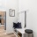 a kitchen with wood cabinets and an entry way