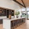 a clubroom with a long table and chairs