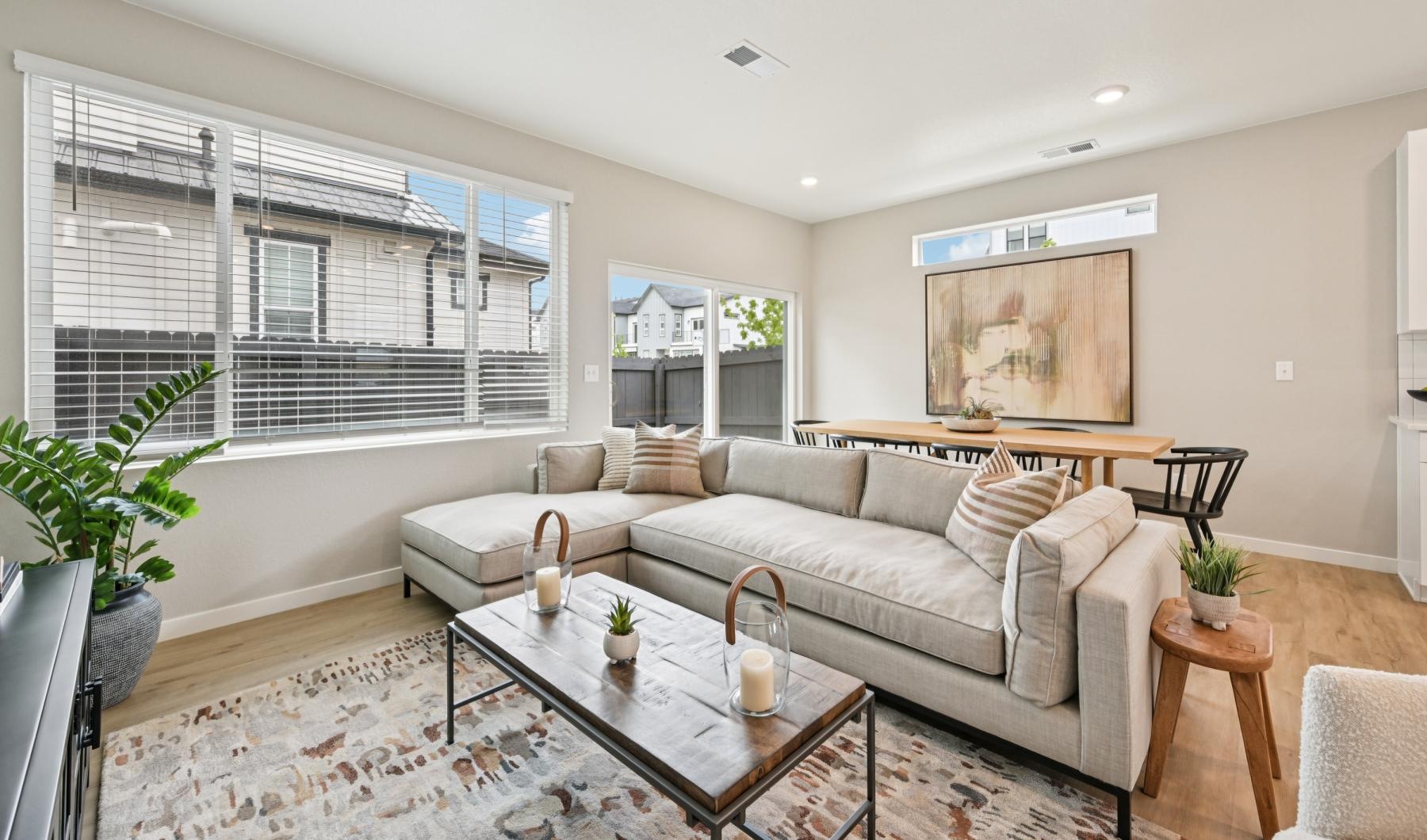 Beautiful living areas to match your lifestyle a living room with a couch and a coffee table
