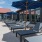 a pool with umbrellas and chairs by it