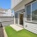 a house with a green lawn