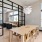 a clubroom with a table and chairs