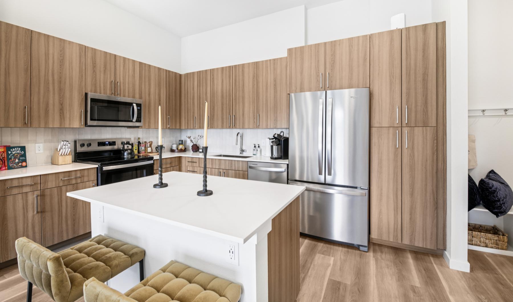 a kitchen with wooden cabinets