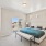 a bedroom with a bed and a bench